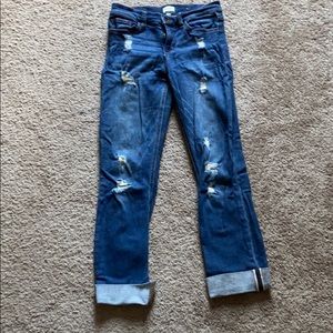 Distressed sneak peek jeans
